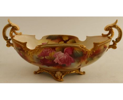 A Royal Worcester boat shaped centre piece, decorated with pink and red roses with leaves by W Harbron, shape number H254, wi