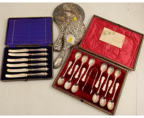 A cased set of hallmarked silver handled tea knives, together with a hallmarked silver dressing table mirror and brush and a 