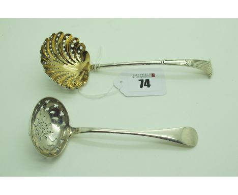 A Victorian Hallmarked Silver Sifter Spoon, Messrs Barnard, London 1882, with gilt pierced bowl; together with a Georgian hal