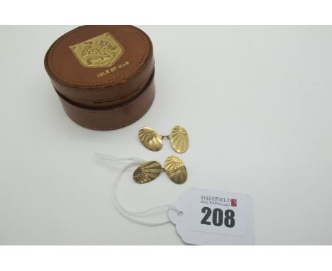 A Pair of 9ct God Cufflinks, the oval engine turned panels on chain connections (2.9grams); together with a vintage Isle of M