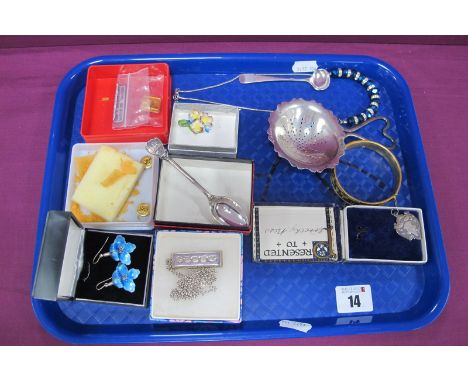 A Hallmarked Silver Tea Strainer, hallmarked silver teaspoons, a hallmarked silver ingot pendant, decorative enamel flower ea