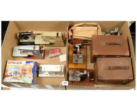 Collection of seven miniature children's vintage Sewing Machines: (1) Grain (UK) green cast iron Sewing Machine, hand operate