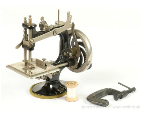 Singer Model 20 (USA) miniature antique Sewing Machine, cast iron and tinplate, crank handle, chain stitch, some surface corr