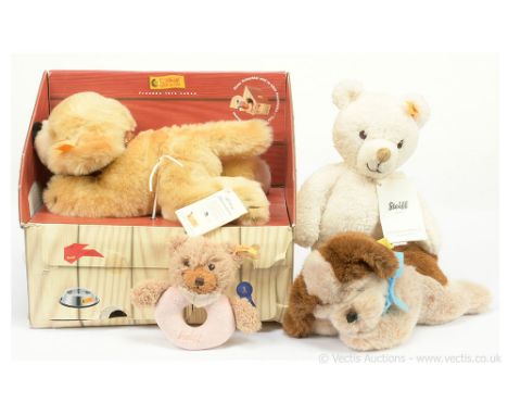 Steiff four plush toys: (1) Golden Retriever dog puppy set, yellow tag 079344, with yellow cloth tag, button, swing label, al