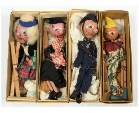 Pelham Puppets collection of four vintage marionettes: (1) Sandy MacBoozle, within yellow box; (2) Witch, within yellow box; 