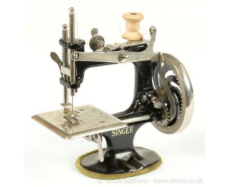 Singer Model 20 (USA) miniature antique Sewing Machine, cast iron and tinplate, crank handle, chain stitch, some surface corr