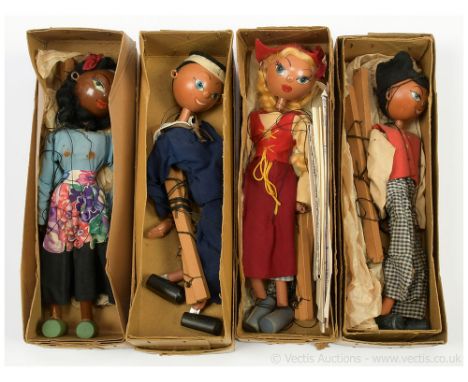 Pelham Puppets collection of four vintage marionettes: (1) "N****r Girl", within brown box; (2) Sailor, within brown box; (3)
