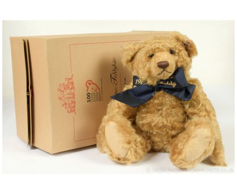 Steiff Centenary bear, white tag 670985, LE to year- 2002, dark blonde wavy mohair teddy bear, wearing navy shot silk ribbon 