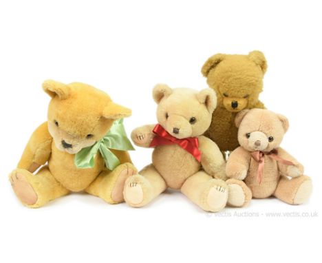 Four vintage teddy bears: (1) Shanghai Toys unusual golden wool plush, clear glass eyes, with black pupils and remains of pai