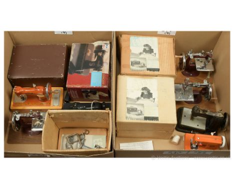 Collection of seven miniature children's vintage Sewing Machines: (1) Made in the USSR cast iron Sewing Machine, finished in 