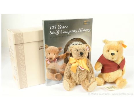 Steiff pair of teddy bears: (1) Steiff Danbury Mint Winnie the Pooh, yellow tag 660474, blonde mohair, wearing red waistcoat,