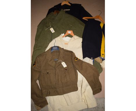 A British Army groundsheet/poncho; a nightshirt with the initials 'MB' embroidered on; a Light Infantry jacket and trousers i