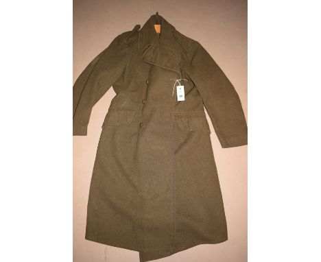 A British Army Issue Greatcoat, with embroidered label to the inside stating Size 4, Height 5ft. 5in. to 5ft. 6in., chest Siz