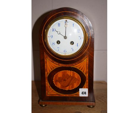 An Edwardian inlaid mahogany mantel clock, with enamelled arabic dial, French Daum movement by Mougin.