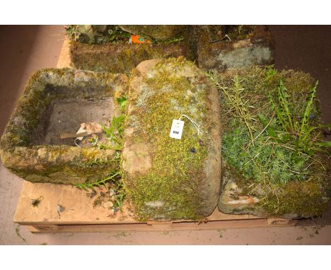 Three antique sandstone trough planters.