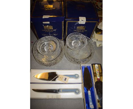 A collection of cake knives and cake slices with ceramic handles, by Wedgwood and Coalport, in original boxes; two pairs of c