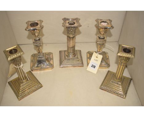 Two pairs of EPNS candlesticks; one by J. H. Potter, Sheffield unmarked; and a similar single candle stick.  (5)