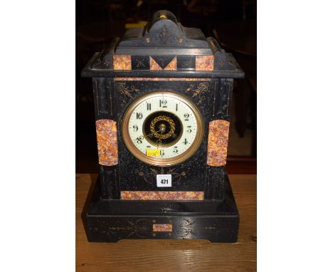 A Victorian marble and slate mantel clock, with enamel dial and marble panels.