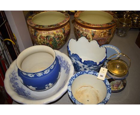 An Adams Tunstall Jasperware jardiniere; a pair of modern Oriental ceramic jardinieres decorated garden scenes; a wash bowl; 