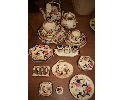 A collection of Mason Ironstone 'Mandalay' pattern china, comprising: two teapots; condiments; various bowls; toast rack; ash