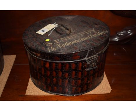 A circular Vintage tin hat box S. Enderby The Northumberland Fusiliers.
