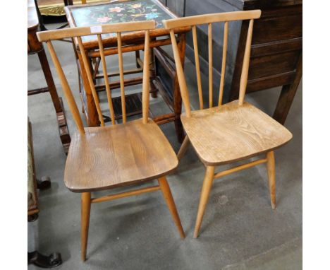 A pair of Ercol Blonde elm and beech 391 model chairs 