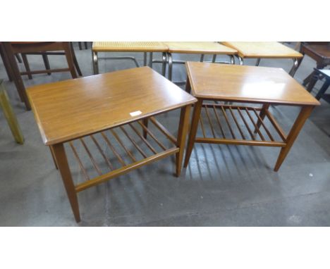 A pair of teak lamp tables 