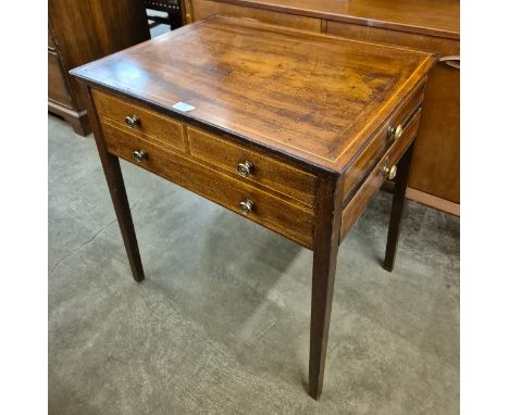 A George III inlaid mahogany three drawer lamp table 