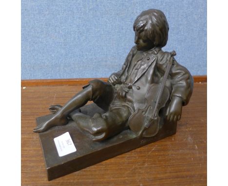 After Leon Tharel (Swiss), bronze figure of a recumbent violinist, 19.5cms 