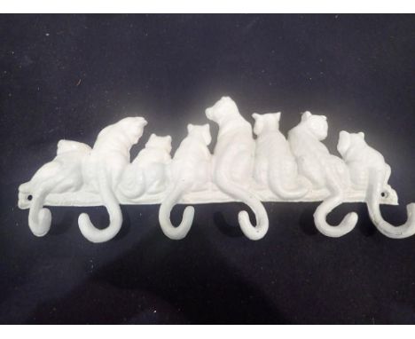 Cast iron cat tail coat hook, W: 25 cm. UK P&amp;P Group 1 (£16+VAT for the first lot and £2+VAT for subsequent lots) 