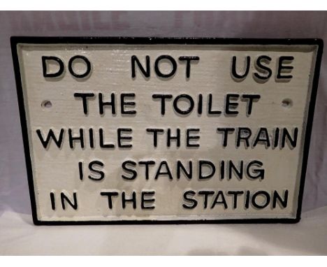 Cast iron 'Do not use the toilet' sign, W: 27 cm. UK P&amp;P Group 1 (£16+VAT for the first lot and £2+VAT for subsequent lot