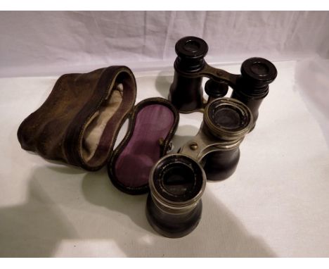 Vintage binoculars, marked 'Chevalier Optical Paris' in leather case and another pair unmarked. UK P&amp;P Group 1 (£16+VAT f
