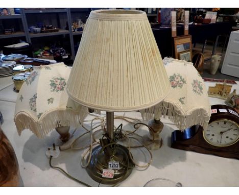 Three table lamps including a pair with alabaster bases. All electrical items in this lot have been PAT tested for safety and