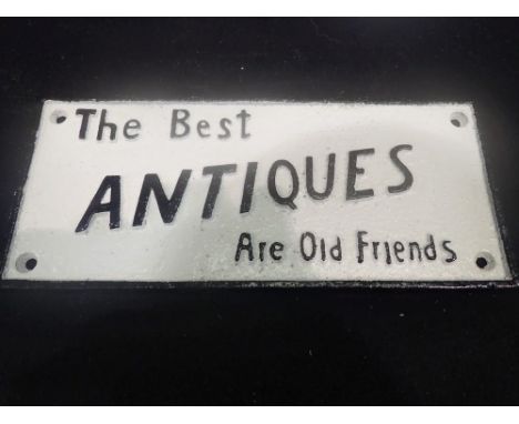 Cast iron 'The Best Antiques Are Old Friends' sign 25cmw. UK P&amp;P Group 1 (£16+VAT for the first lot and £2+VAT for subseq