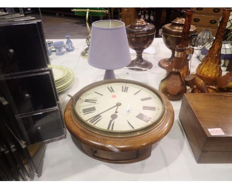 Oak cased wall clock and a ceramic lamp. All electrical items in this lot have been PAT tested for safety and have passed. Th