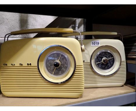 Two Bush radios, model TR82, one blue and one brown with cables, working at lotting. All electrical items in this lot have be