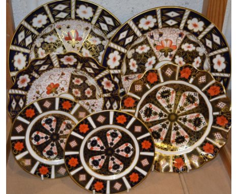 A Royal Crown Derby 1128 Imari fluttered dessert plate , another , 2451 traditional Imari ; a pair of 2451 21cm plates ; a pa