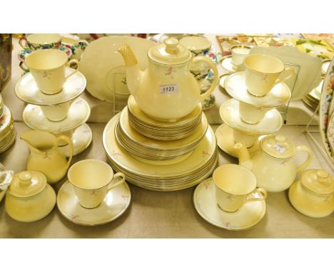 A Royal Doulton Carnation pattern six setting dinner and tea service, including dinner plates, side plates, soup bowls, cups 