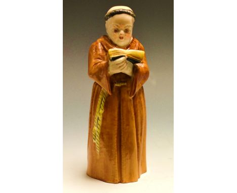 A Royal Worcester candlesnuffer, Monk, holding a prayer book, coloured in flesh tones and brown, 13cm high, printed crown and