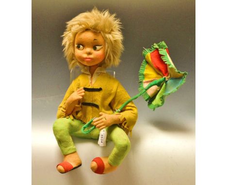 A novelty felt doll, dressed in green breeches and yellow jacket, with light up parasol