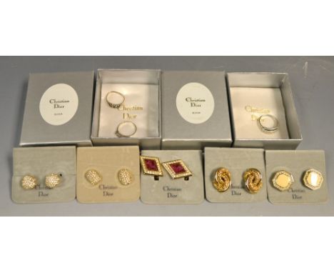 Jewellery - three silver rings; Christian Dior earrings, boxed (8) 