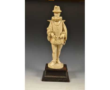 A large Dieppe ivory figure, of an Elizabethan gentleman, he stands, wearing a feathered hat and ruff, hardwood base, 36.5cm 