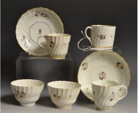 A Barr Worcester spiral fluted coffee cup, tea bowl and saucer, painted with gilt, blue and pink cornflower, incised 'B' and 