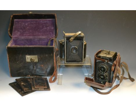 Cameras - a Zeiss Icon Donata folding plate camera, cased; a Rolleiflex Old Standard (3)