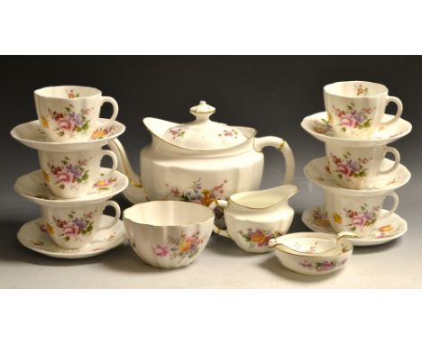 A Royal Crown Derby posies six setting tea service inc. teapot, six cups and saucers, straining spoon and stand etc.