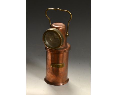 A Type B.E.3 copper and brass miner's lamp, by CEAG Barnsley, swing handle, owners name cartouche R Taylor, war department ar
