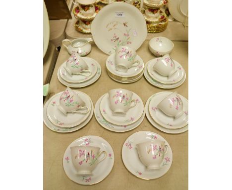A Bavarian tea service, comprising milk and sugar, bread and butter plate, eight cups, twelve saucers, five tea plates, trans
