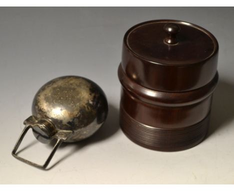 A silver plated grenade form hip flask; a lignum vitae tobacco jar (2)