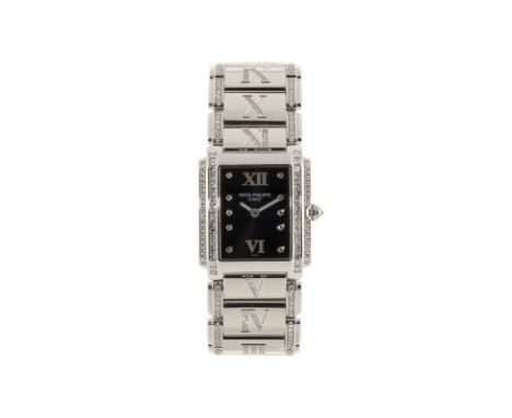 Patek Philippe, Twenty 4, montre-bracelet en or gris sertie de diamants, Signée Patek Philippe, réf. 4910/41, n°mouvement 330