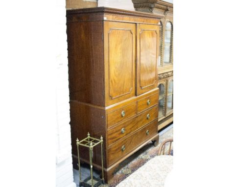 A George III mahogany linen press adapted for hanging, 132cm wide   Condition Report:  Height 197cm and depth 59cm.The linen 